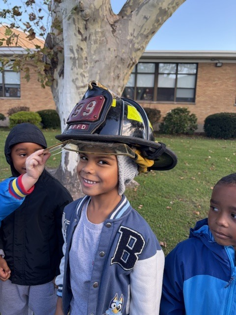 kids by the firetruck