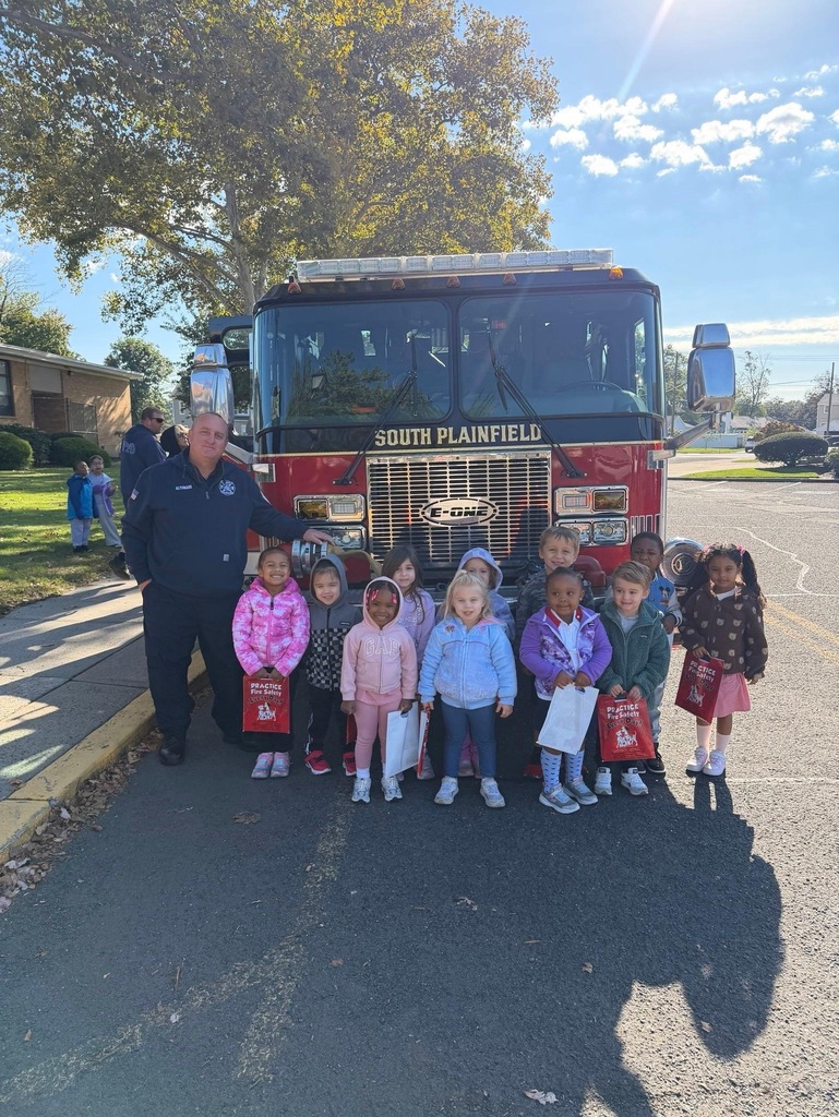 kids by the firetruck
