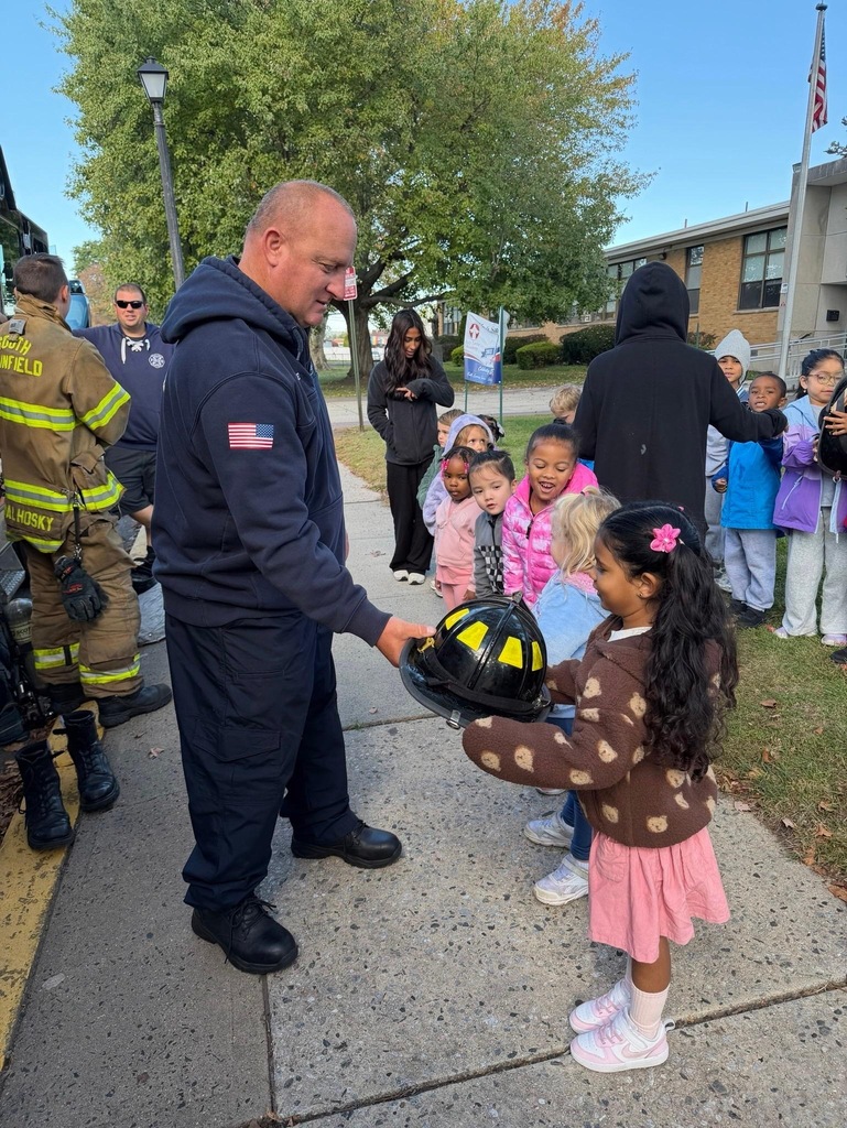 kids by the firetruck