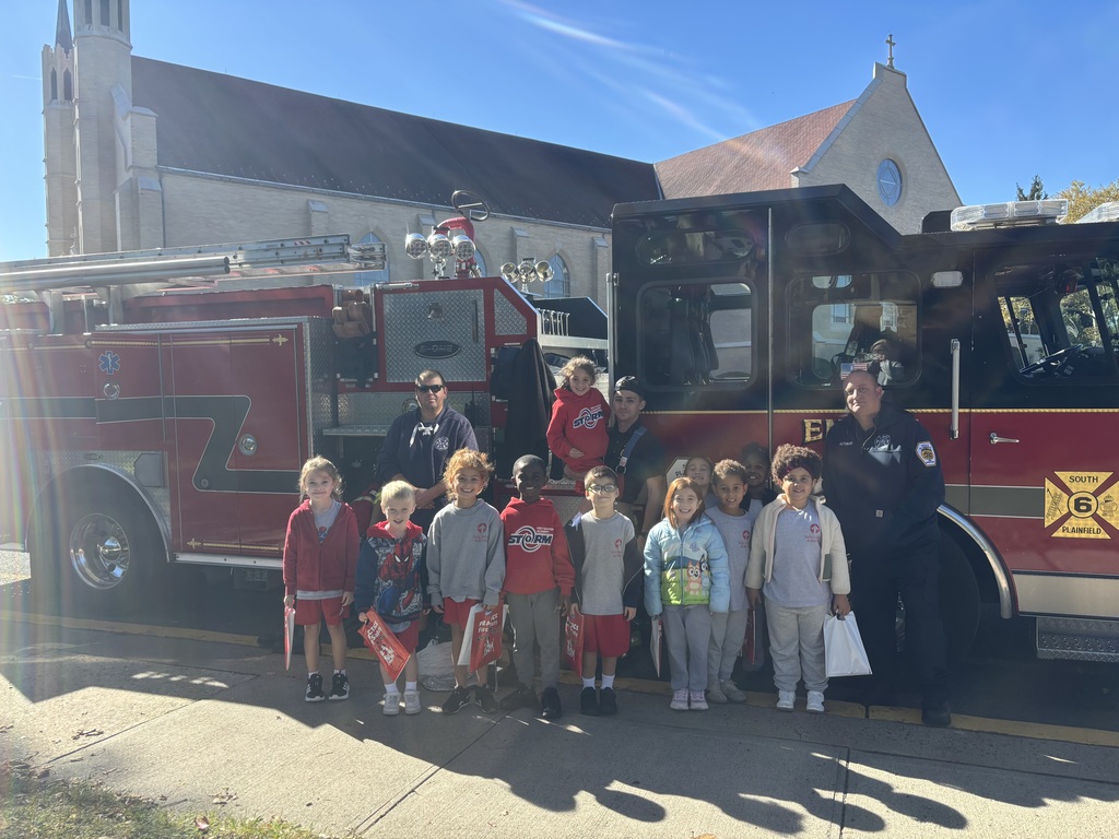 kids by the firetruck
