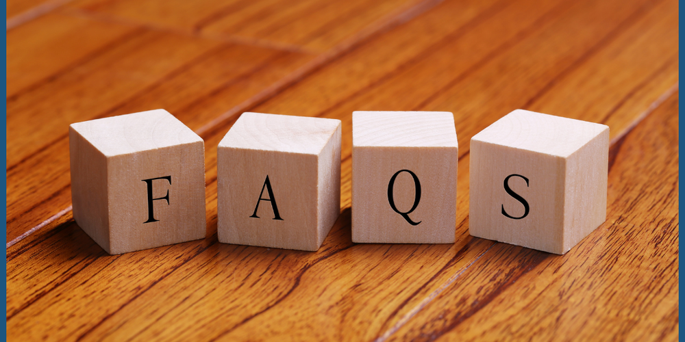 Four dice showing the letters F, A, Q, S