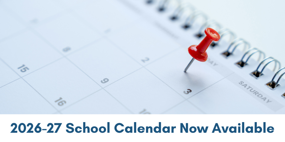 Calendar page with a red pushpin