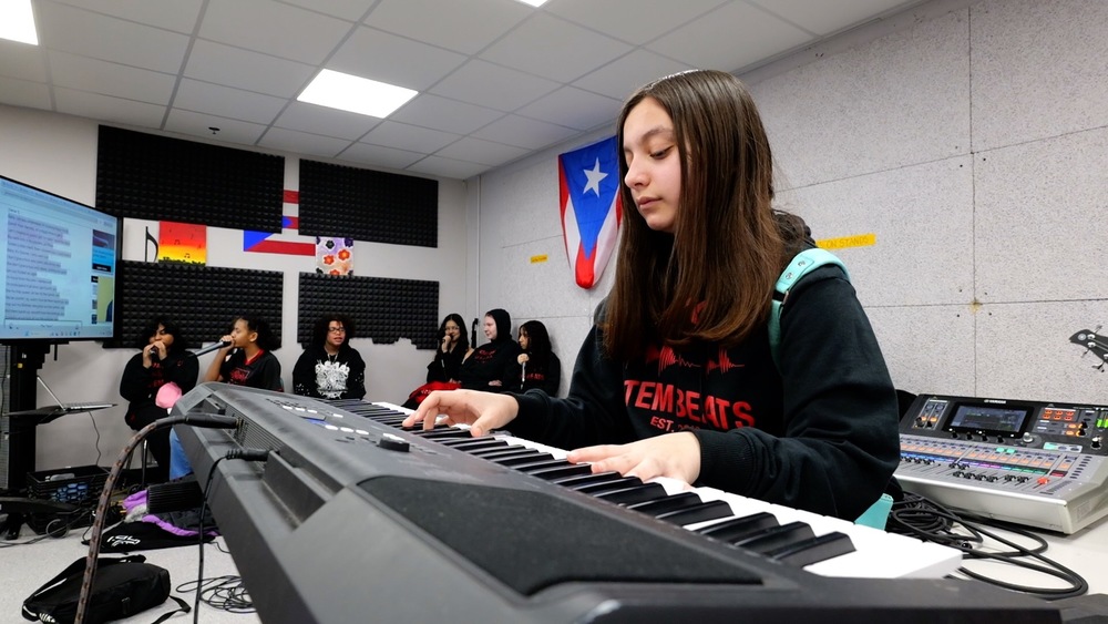 A student plays the piano