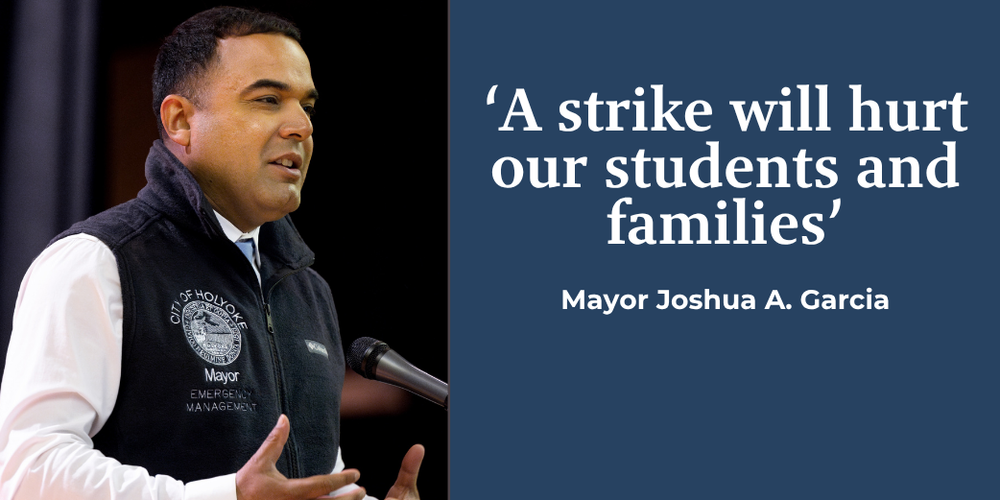 Mayor Josh Garcia at a microphone