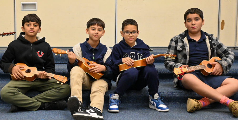 Students at Kelly School play Ukleles and guitars