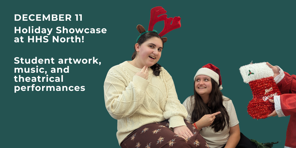 Two students wearing holiday hats with Santa hands holding red stocking