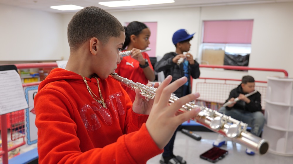 E.N. White students play the flute