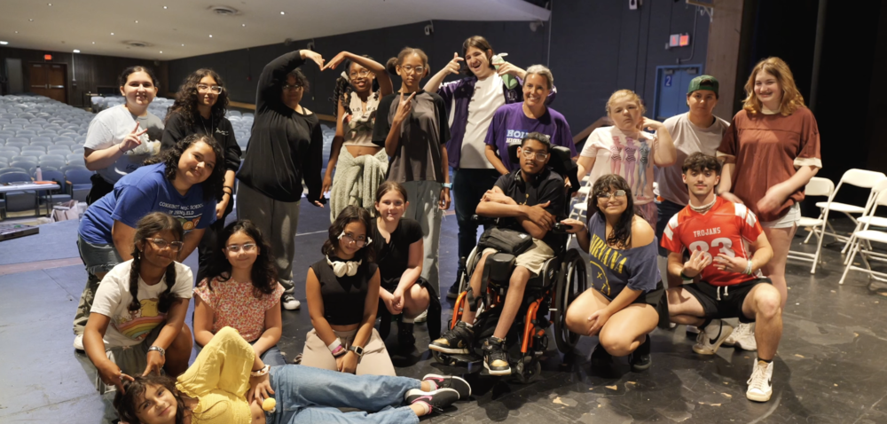 A group of theater students poses for a photo