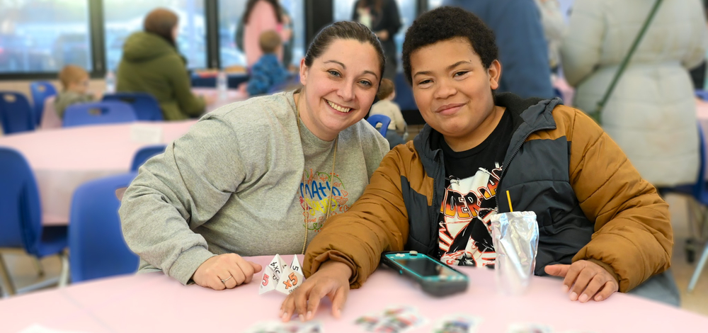 Student and teacher at open house event