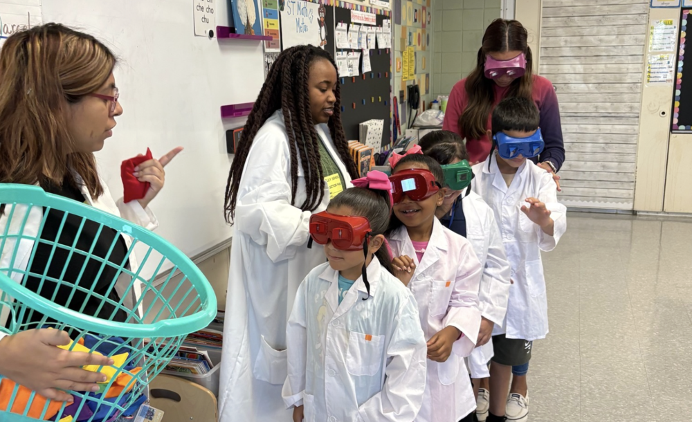 Students prepare to do a beanbag activity