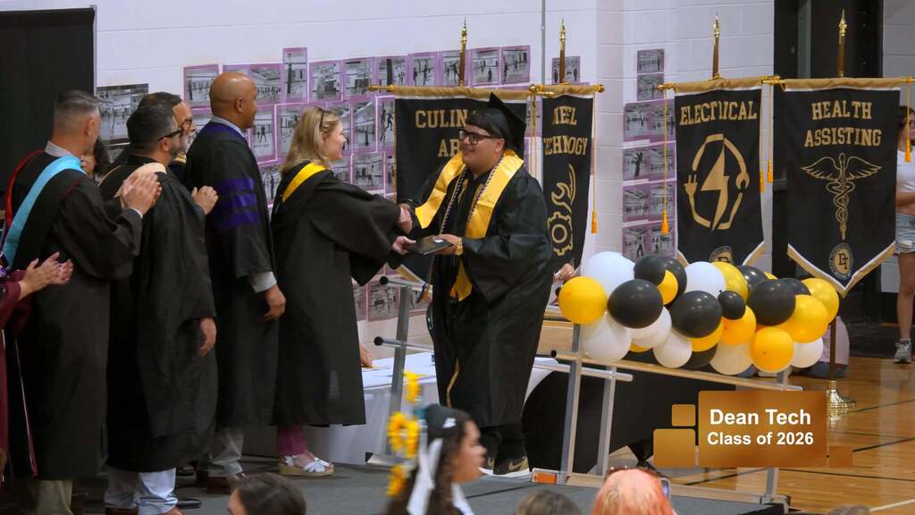 Student receiving Diploma