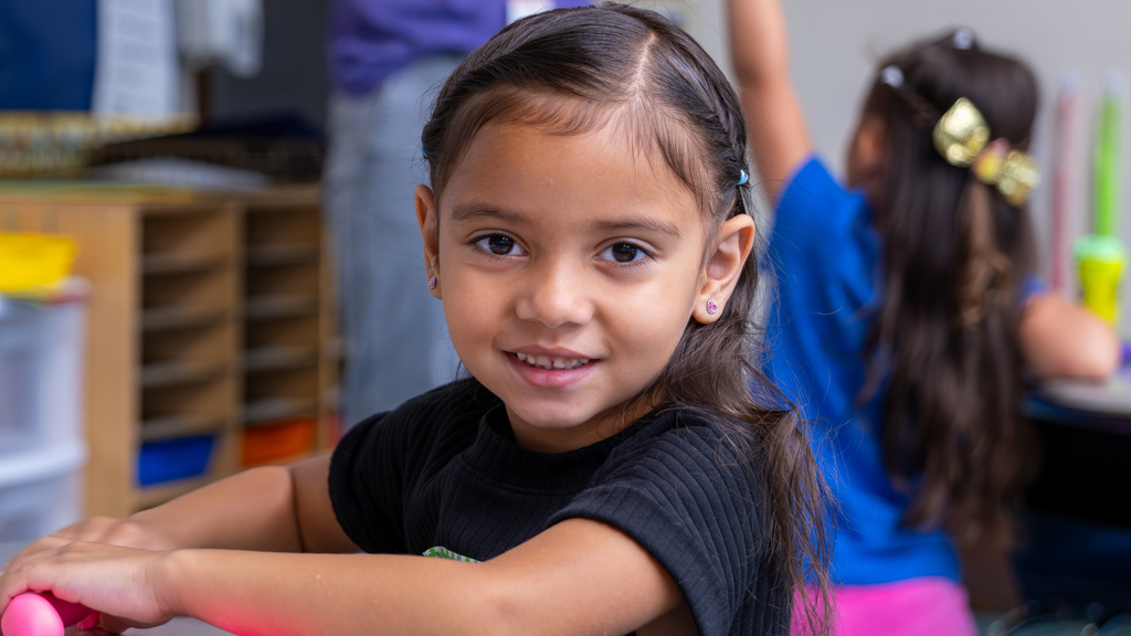 Lawrence Kindergarten student looks at camera