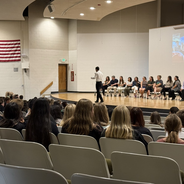 students in an assembly in the auditorium 