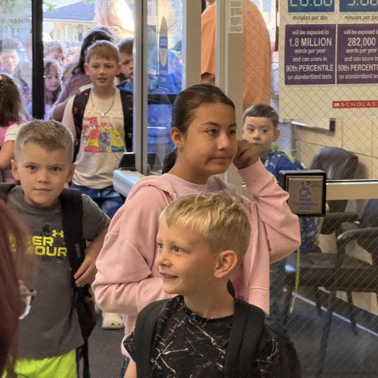 students coming in the door  