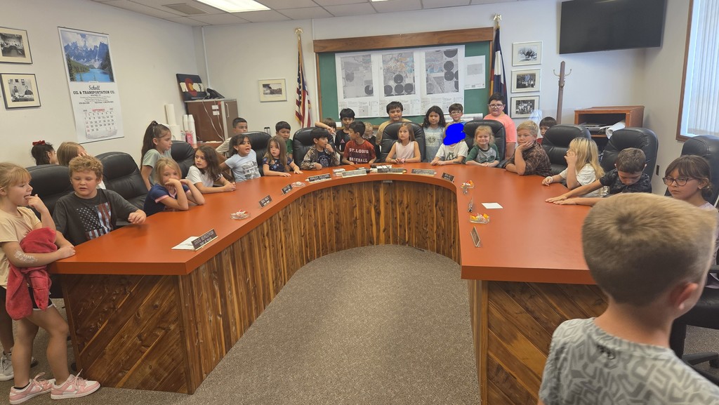 students sitting in city hall chambers