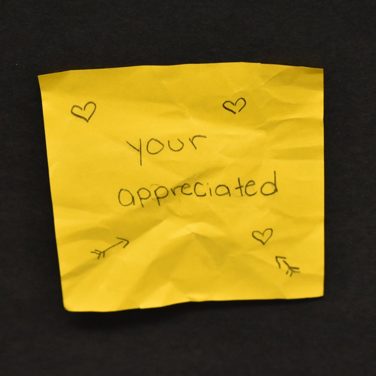 Sticky note that reads "your appreciated" 