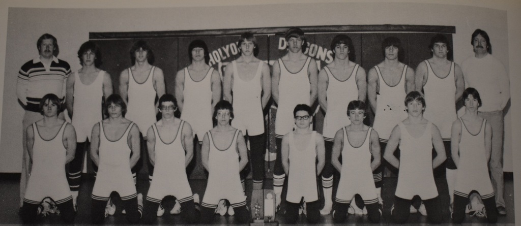 High school wrestling poses for a picture