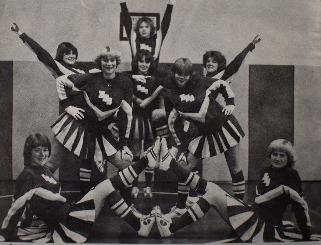 #TBT Jeanine Lakin Head, Kim Lutz, KayLee Redmon, Kim Baker, Marcia Bernard, Linda Willmon, Kathy Gribben, and Marla Newman posing for the pom-pon squad group photo in the late 1970s. #DragonPride #OnceADragonAlwaysADragon #LeaveALegacy