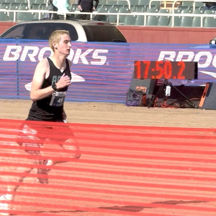 boy running cross country 