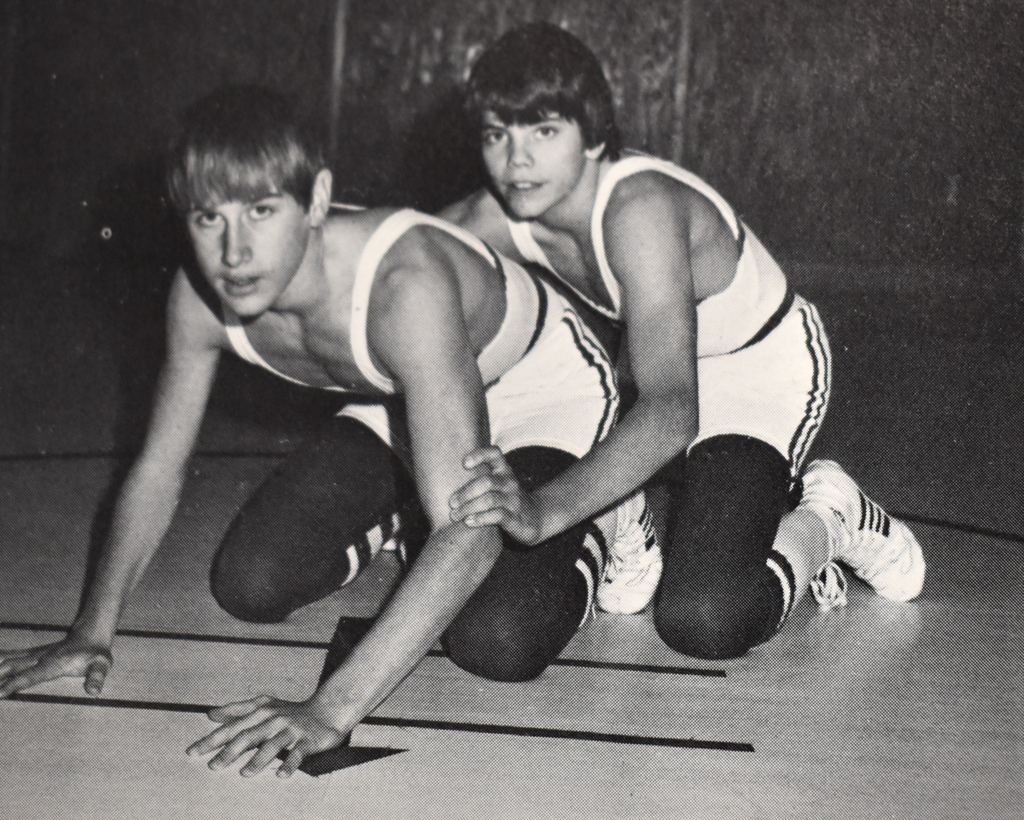 In 1975, Mike Vasa, weighing 126, and Randy Kramer, weighing 132, posed together in the referee's position.