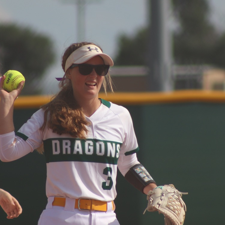 girl throwing softball