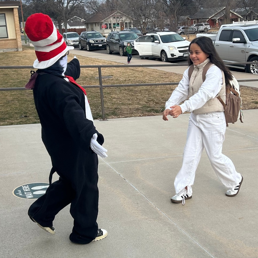 Cat and the hat greets a student