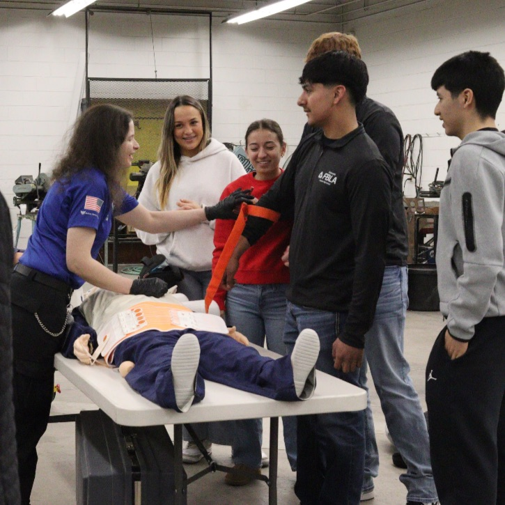 students listen to paramedic