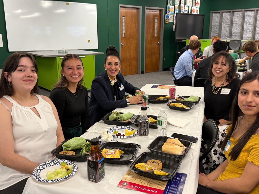 Students engage with a supreme court justice over lunch
