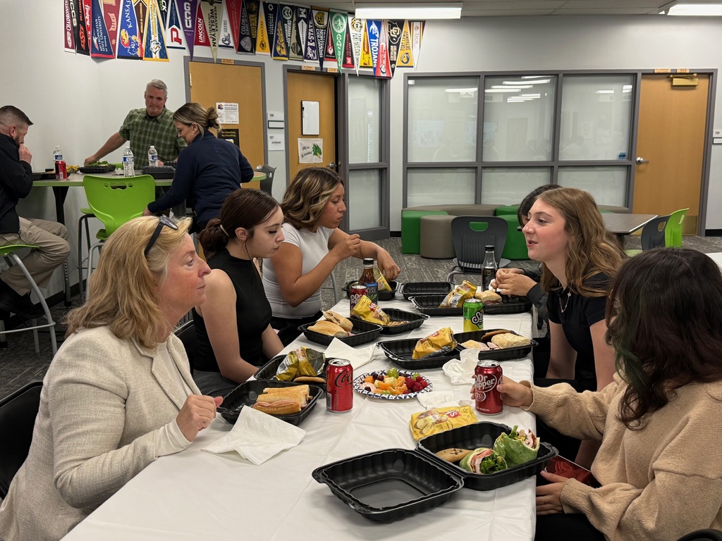 Students engage with a supreme court justice over lunch