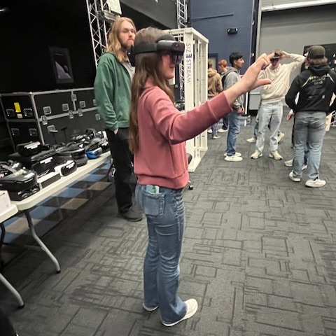 Students using VR headsets. 