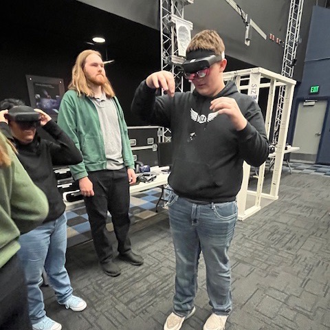 Students using VR headsets. 