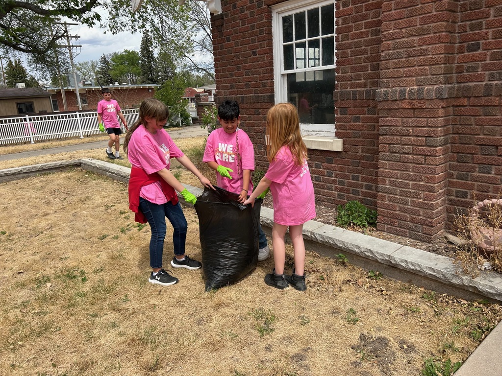 Students working to collect trash.