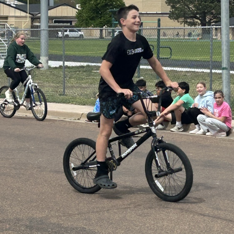 boy riding a bike