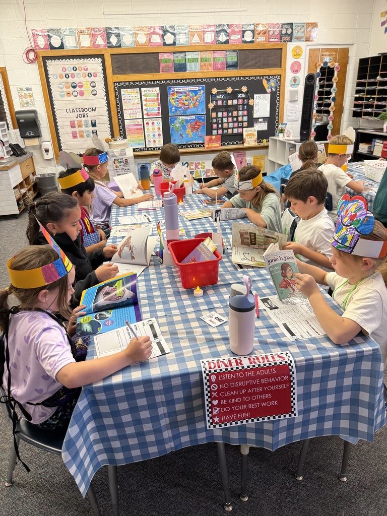 Mrs. Pelle turned her classroom into a “restaurant” and her students did a book tasting. 