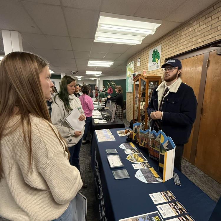 students visit with representatives from higher ed.