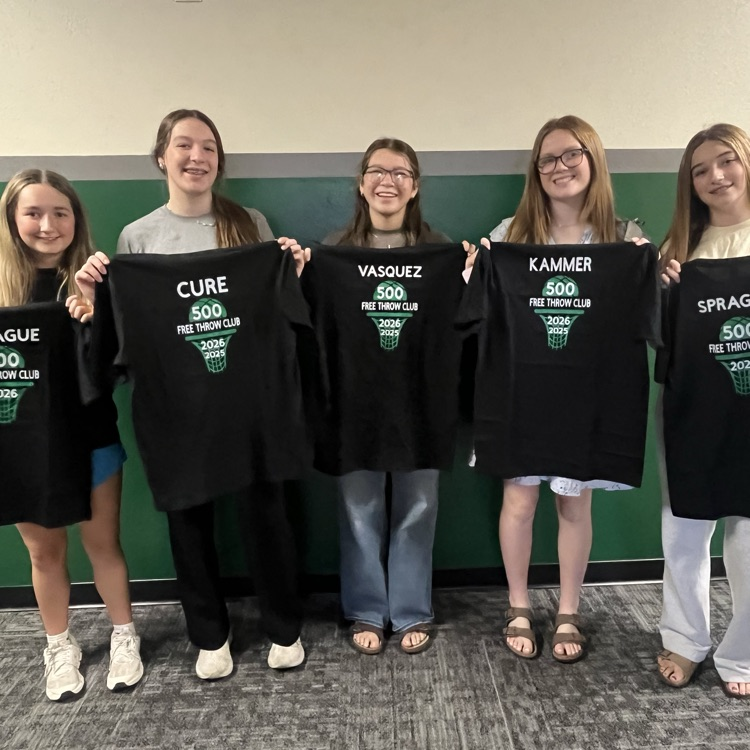 girls holding t-shirts 