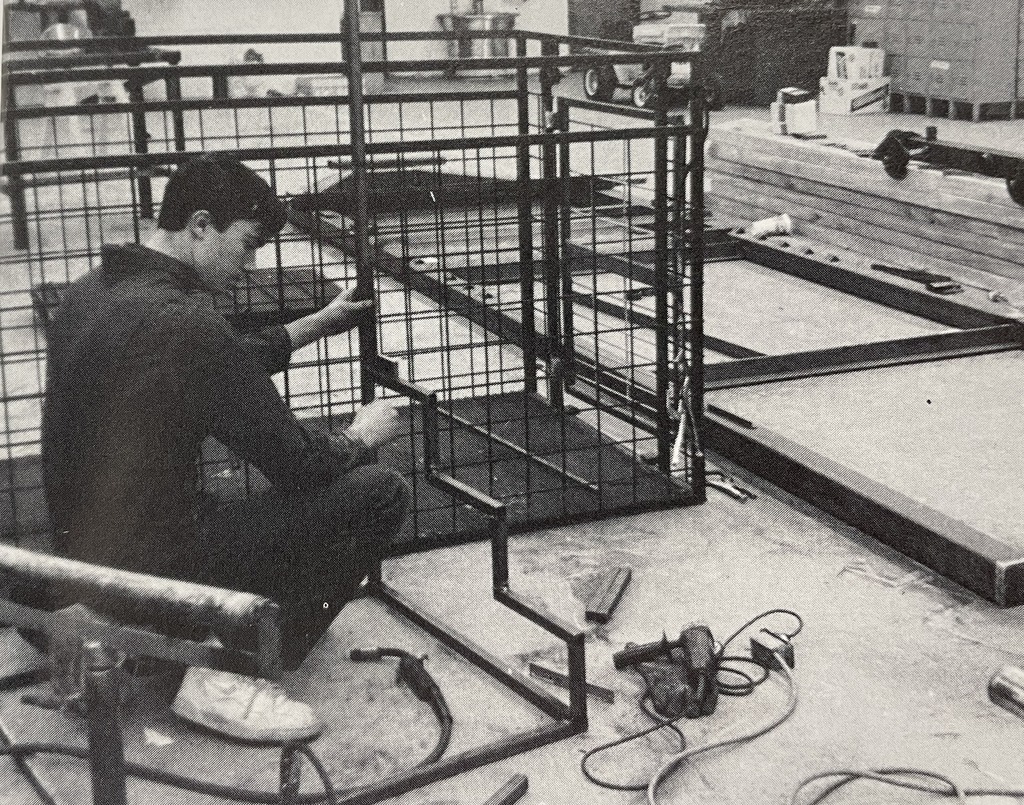 FFA member West Mosenteen works on the new auditorium stairs, well 1990 new. We hope for a great time for the FFA national conference this week.