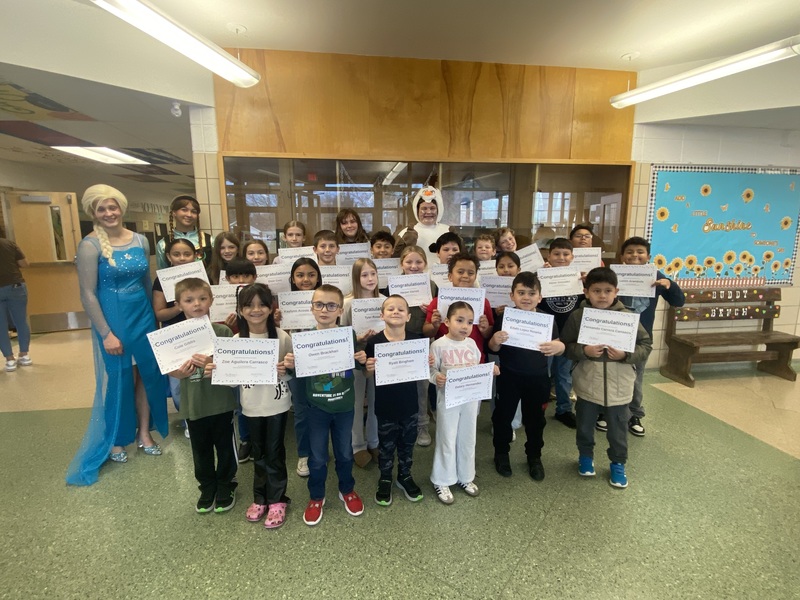 students holding a certificate 