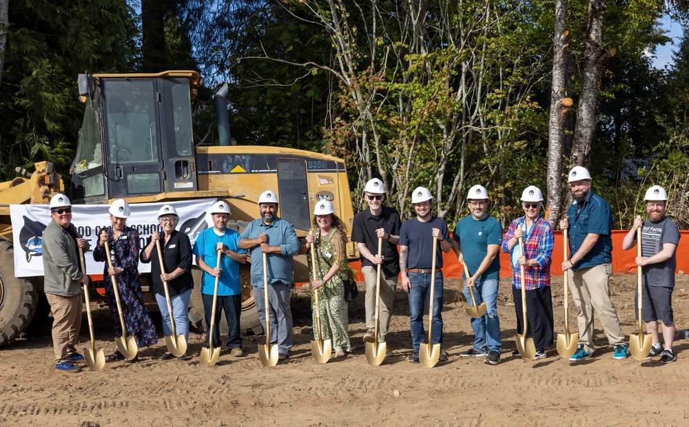 Representatives from Hood Canal, the Skokomish Tribe, and the community pose for a picture as they break ground on the Hood Canal Campus Expansion project.