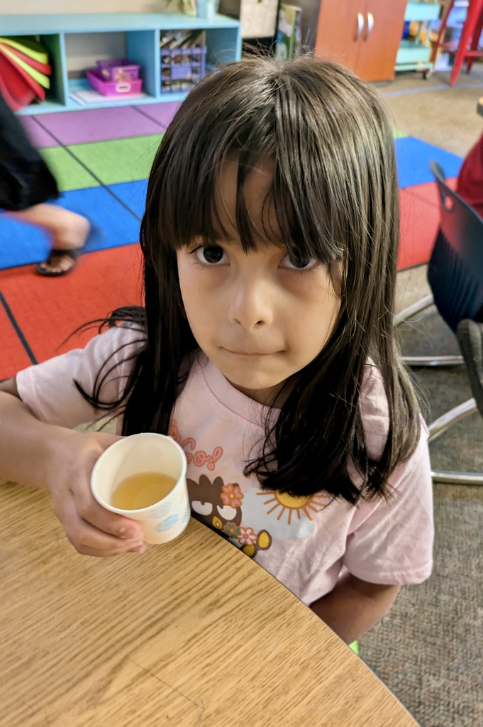 students trying nettle tea