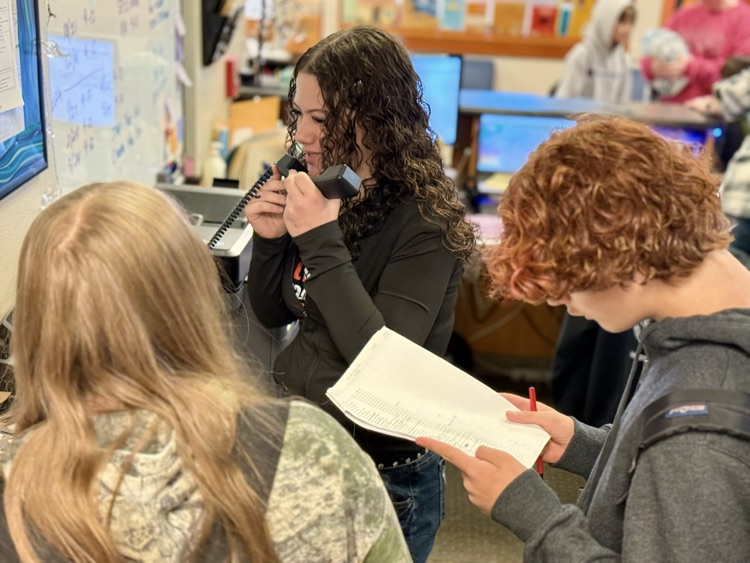 students making announcements