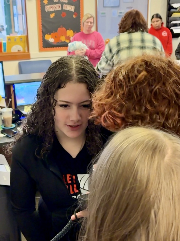 students making announcements