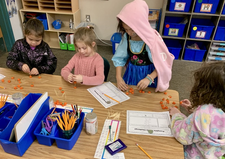 kids making pumpkins