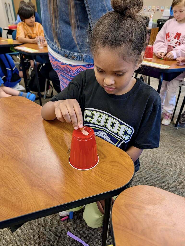 Soon to be 3rd grader playing a game.