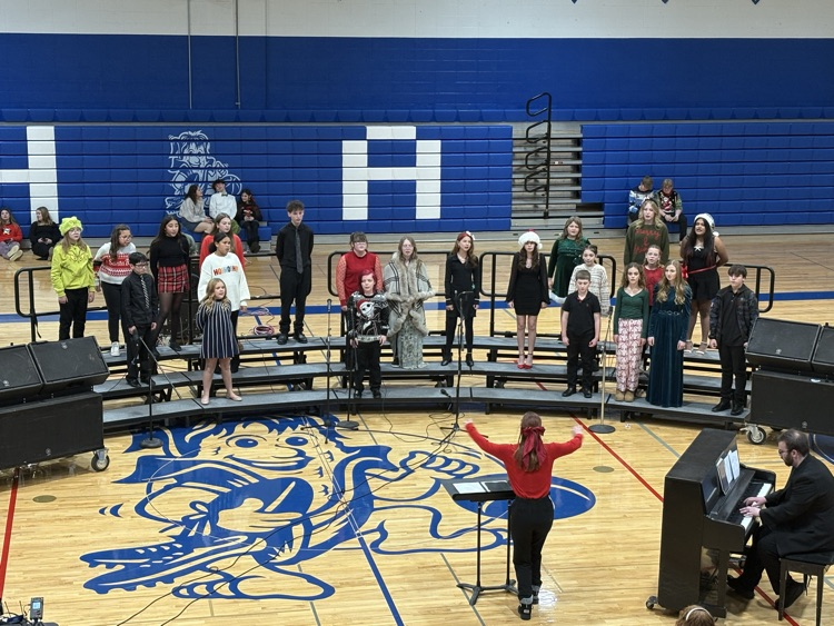 HAMS choir performing at the MS/HS Christmas Concert directed by Mrs. Gonzalez in the HAMS gym  