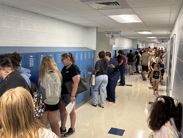 Students practice locker combinations