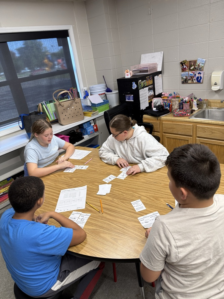 Mr. Rush's classes are learning about food chains by playing a card game where they are trying to build the longest chain!