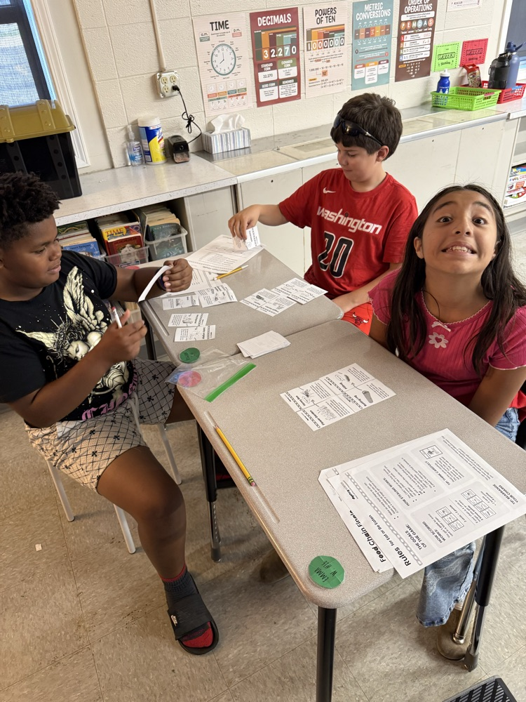 Mr. Rush's classes are learning about food chains by playing a card game where they are trying to build the longest chain!
