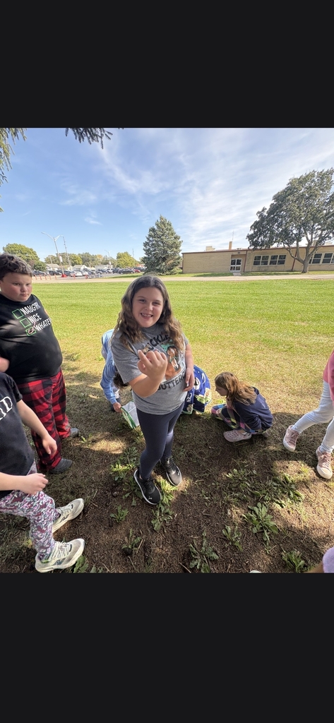 Student holding butterly