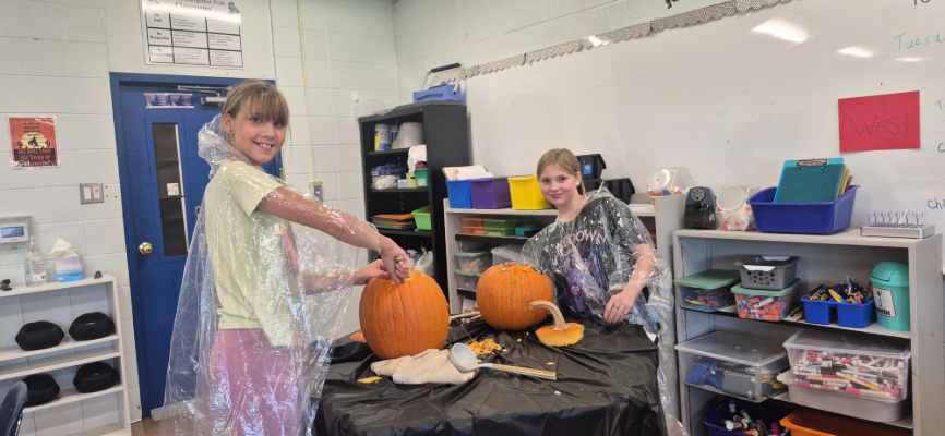 Scooping pumpkin guts